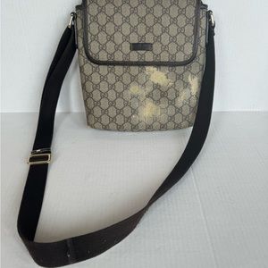 Gucci purse with paint splotches